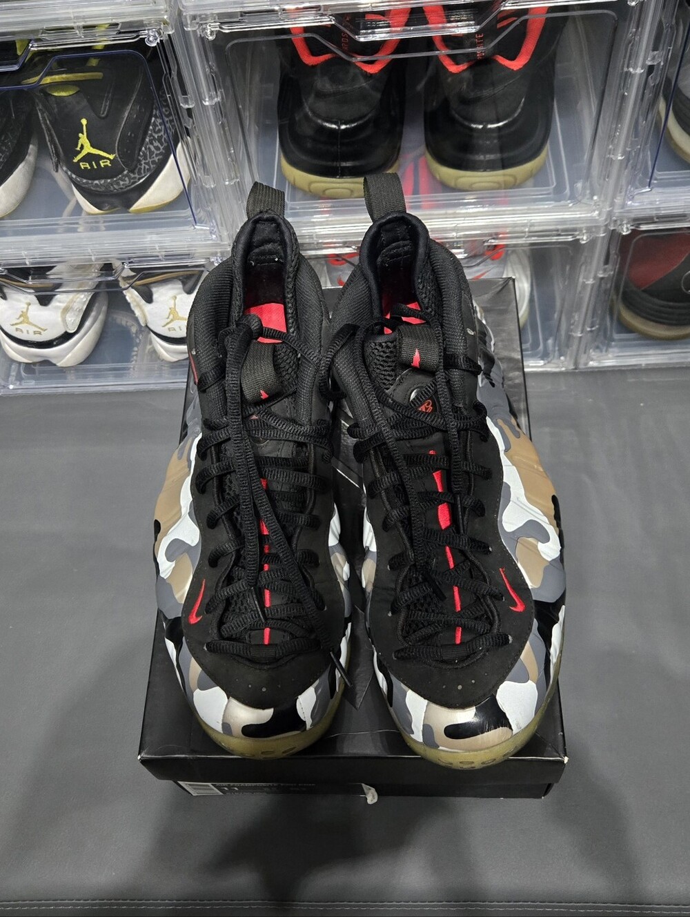 Nike Men's Black Camo Foamposite Sneakers with Red Accents